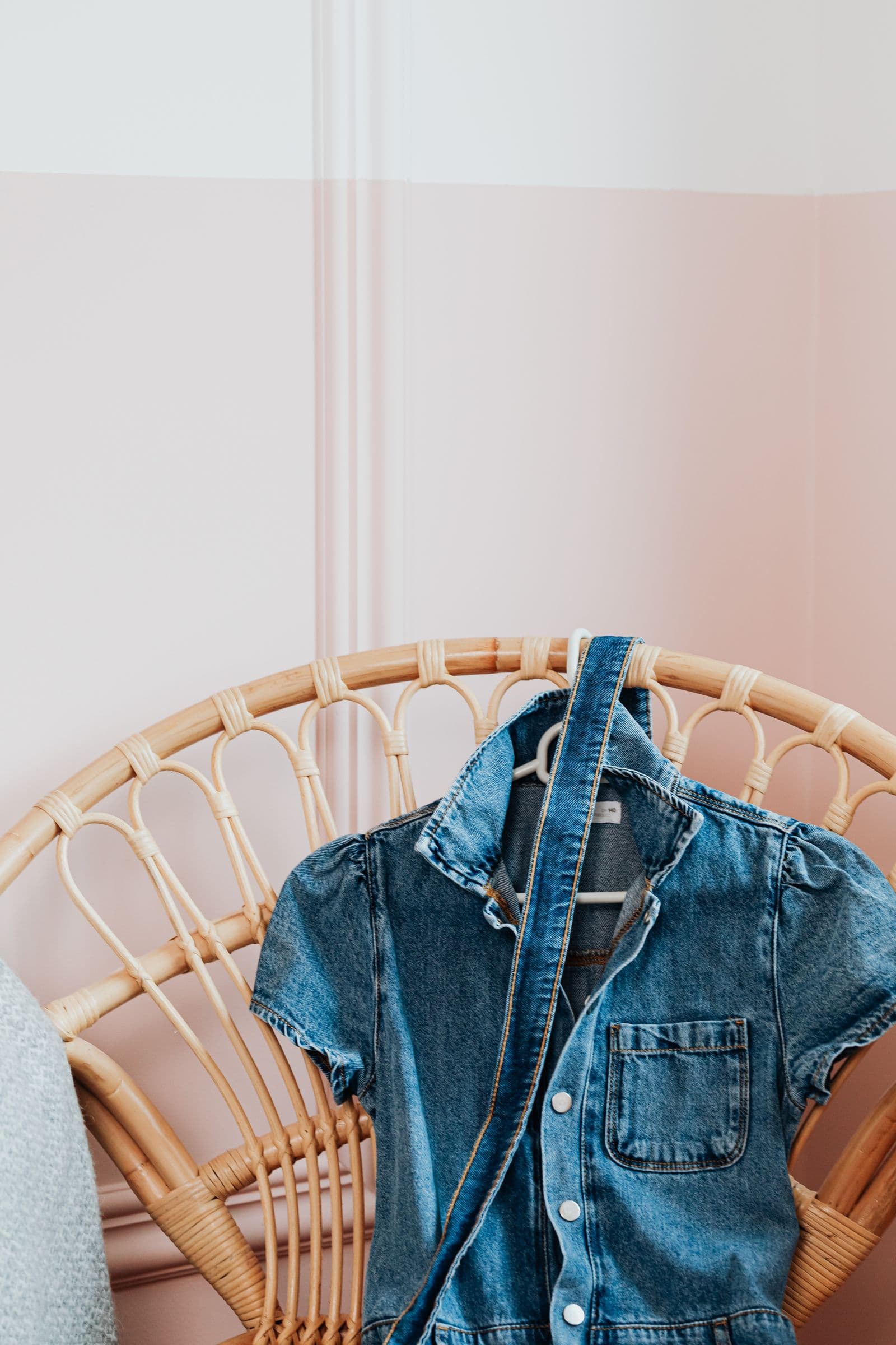 The overshirt that ends up on the chair — worn over everything, ironed never.