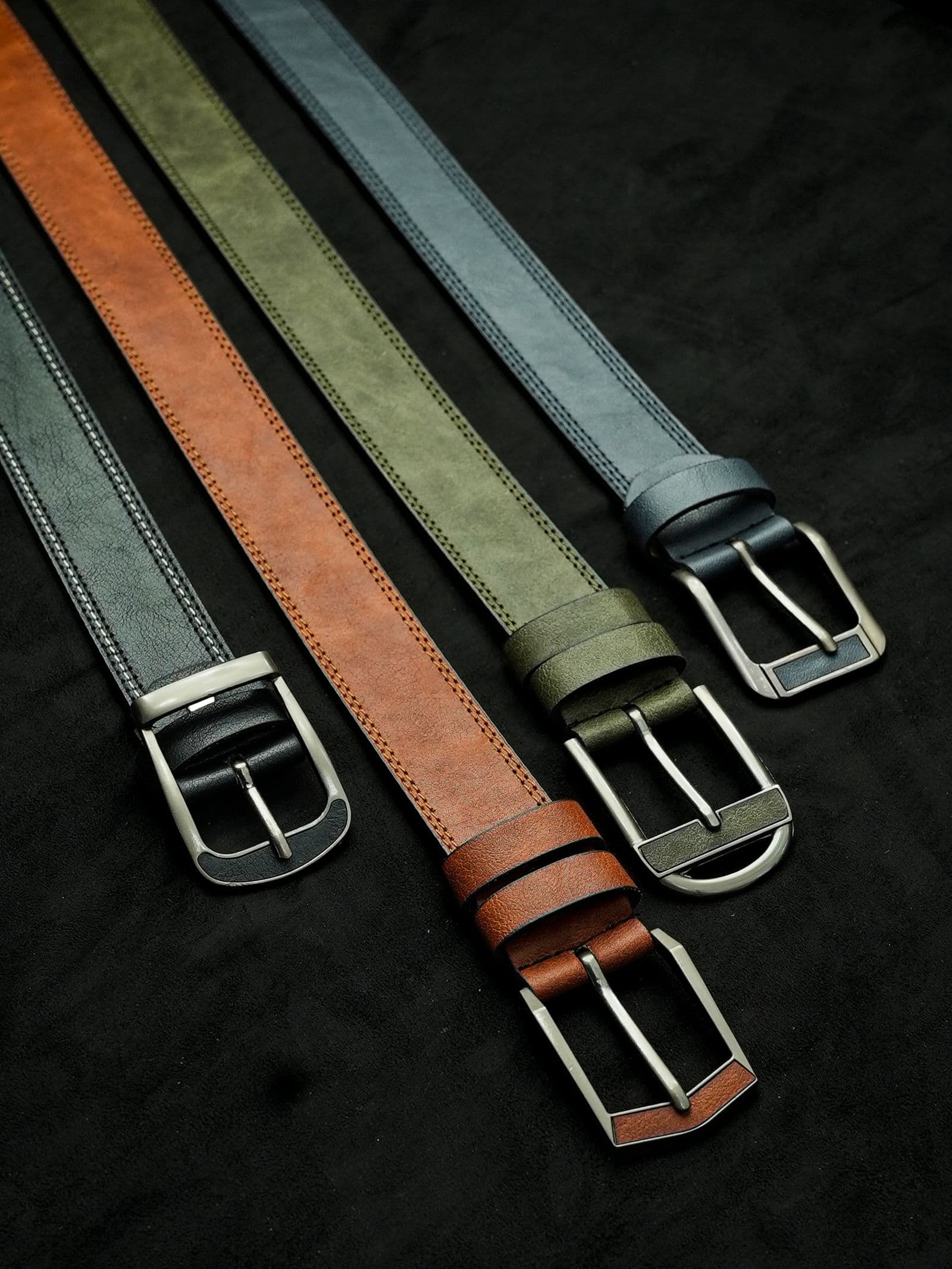 Full-grain bridle leather, cut and edged by hand. It outlives the trousers.