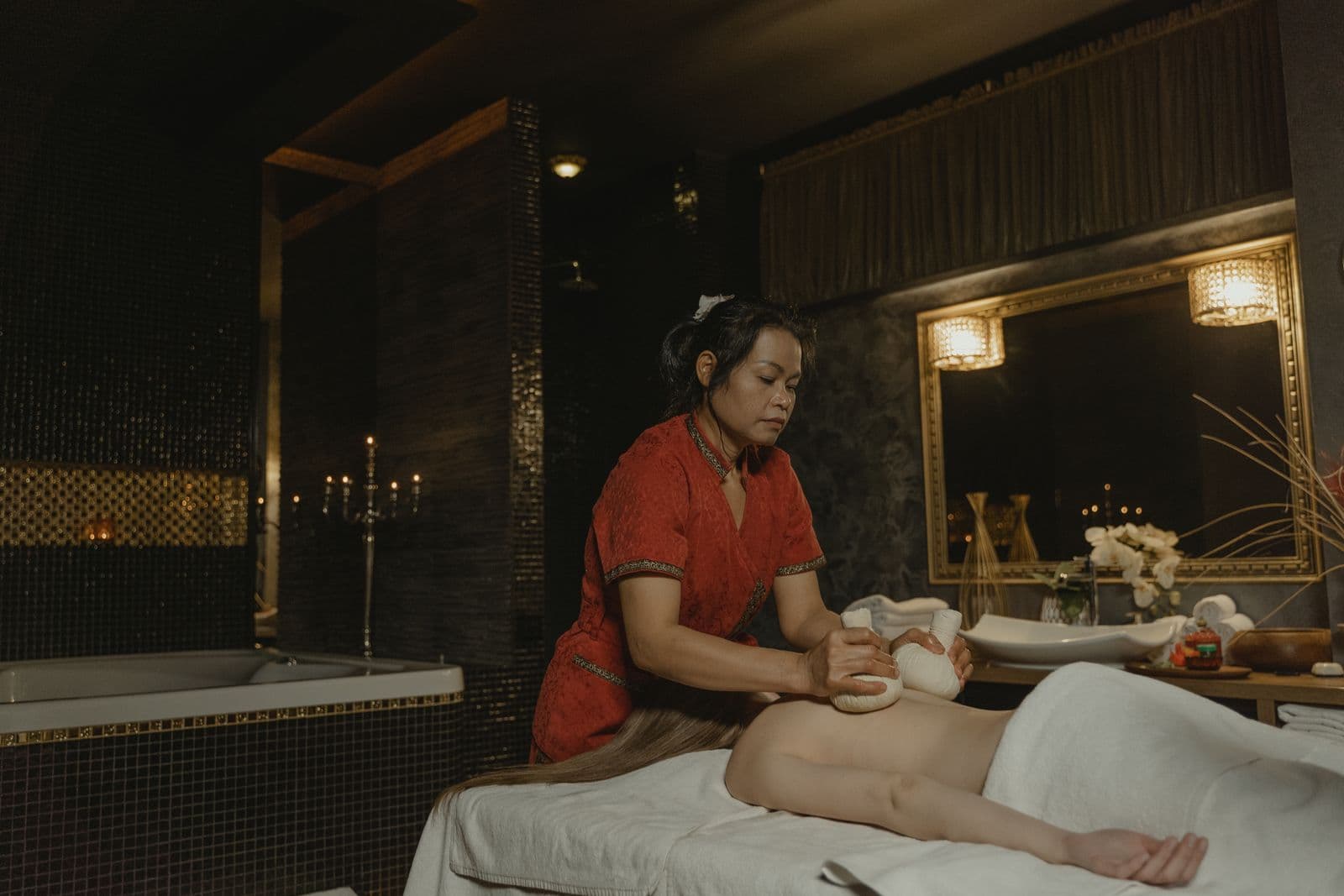 Therapist performing a massage