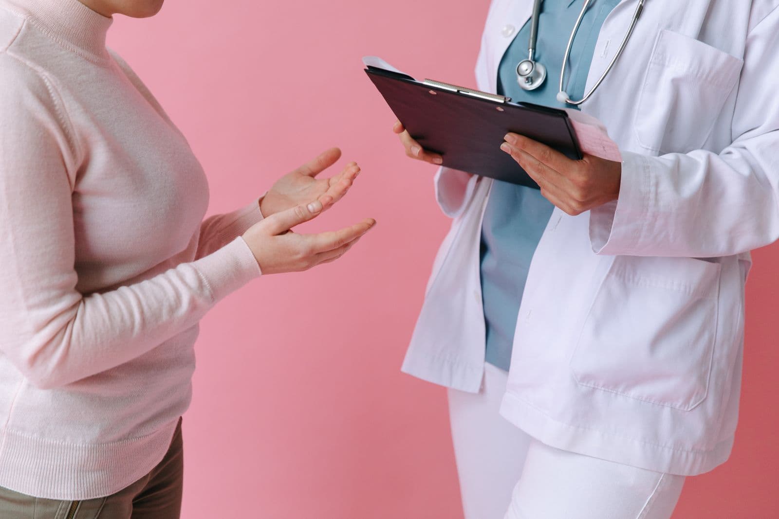 Doctor consulting with a clipboard