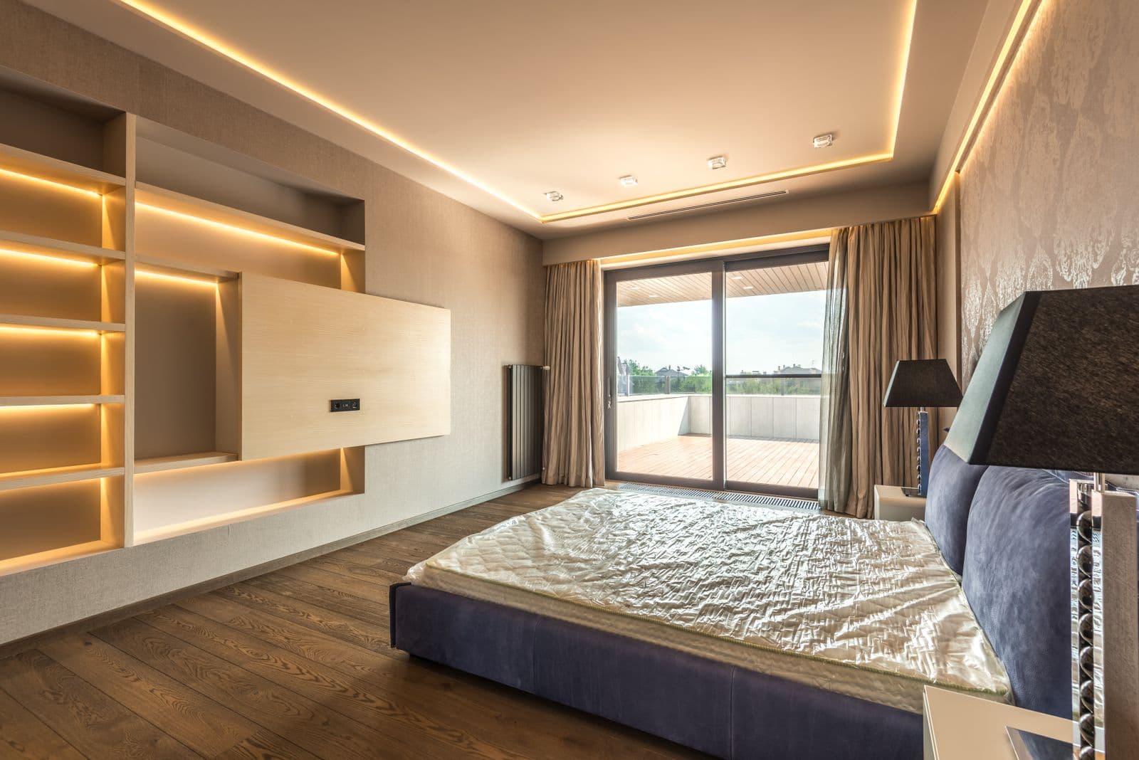 Penthouse bedroom with city view