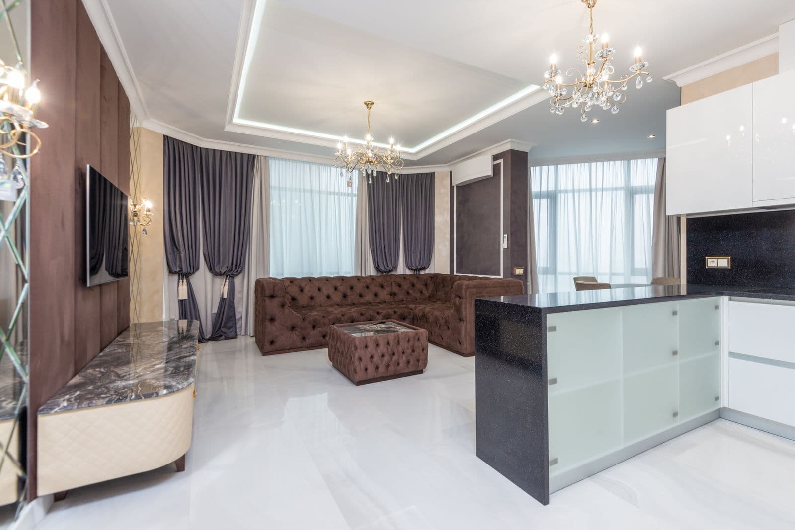 Formal living room with chandeliers