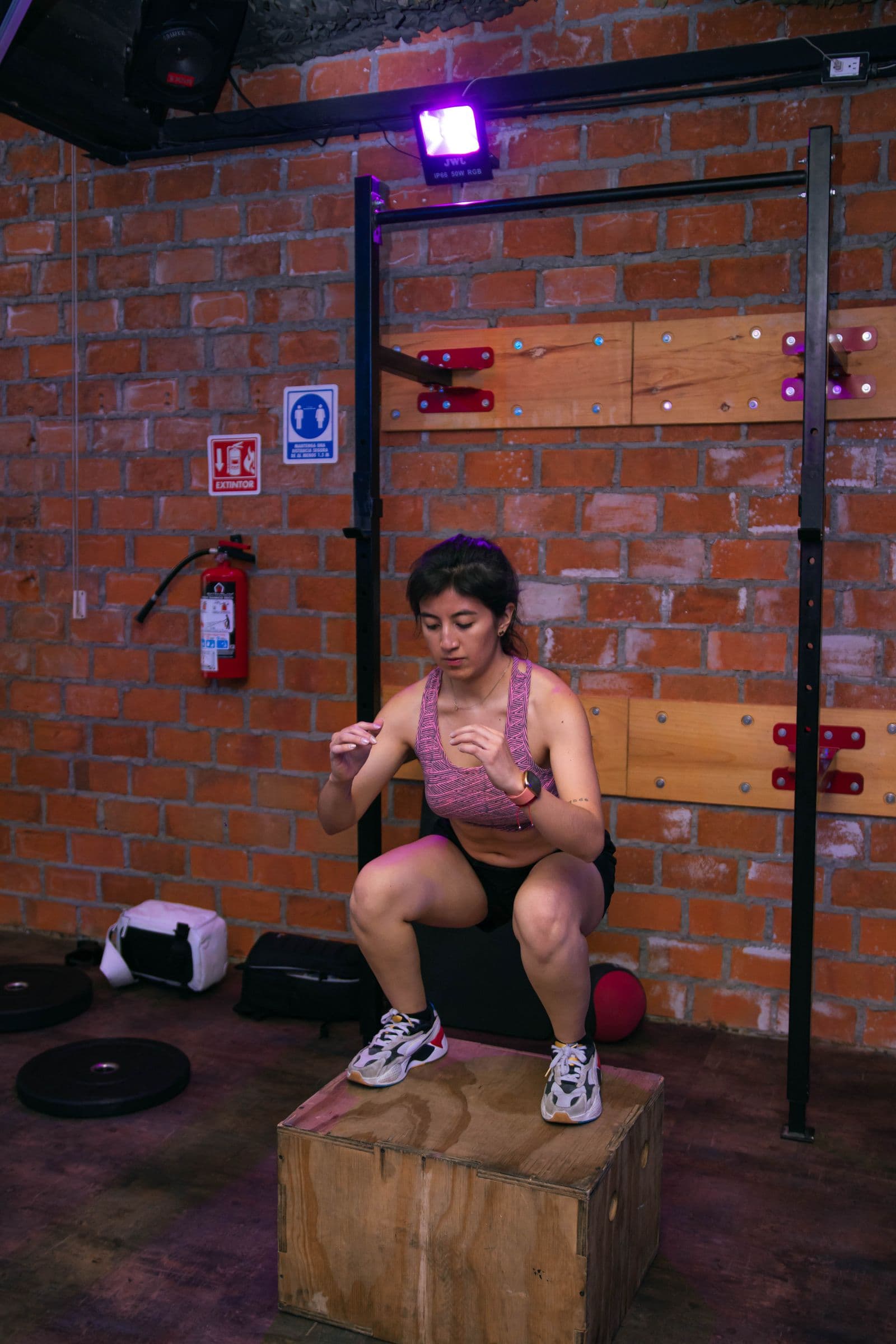 Woman doing box jumps