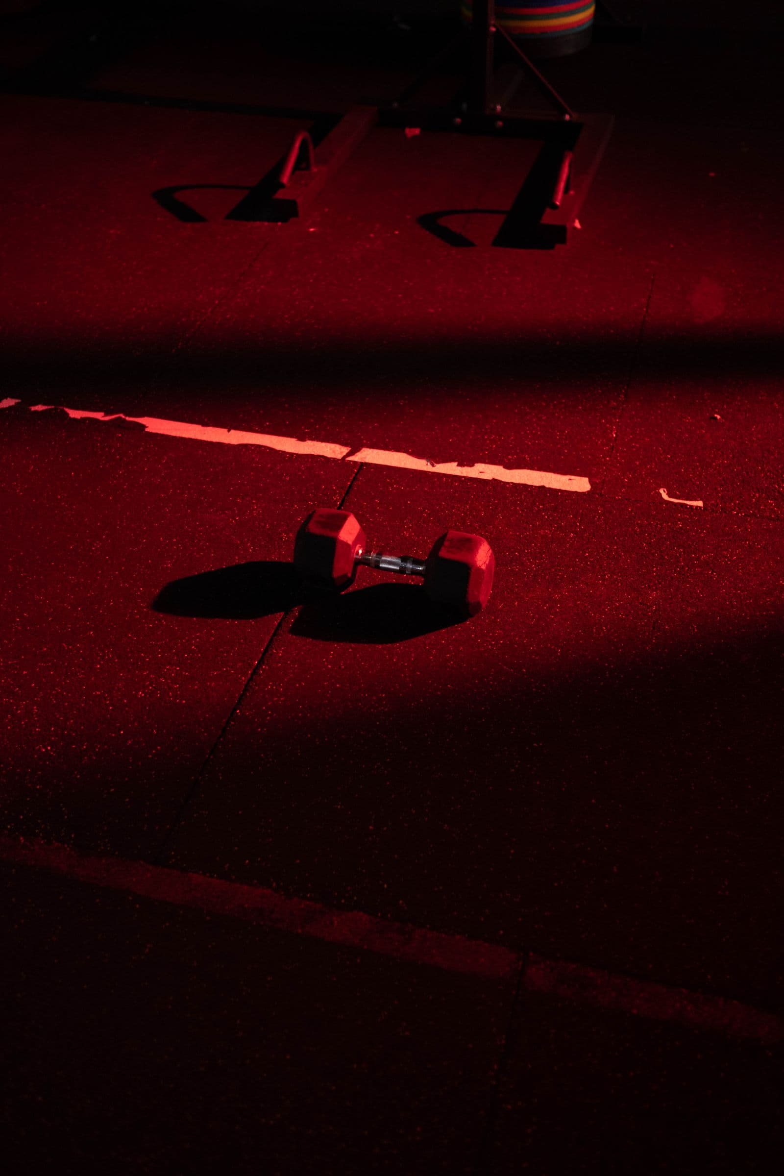 Single dumbbell under red light
